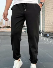 czarne-spodnie-dresowe-joggery-klasyczne-gladkie-guziki-shein-s