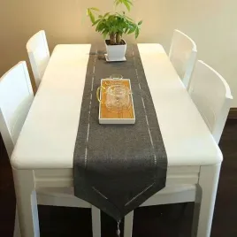 bieznik-na-stol-dekoracyjny-z-fredzlami-kolor-ciemnoszary-32x180cm