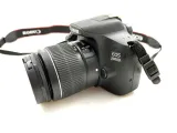lustrzanka-canon-eos-2000d-korpus-obiektyw-stabilizacja-optyczna-obiektywu