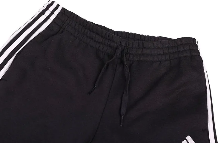 spodnie-adidas-essentials-tapered-elasticcuff-3-st-sklad-materialowy-53-percent-bawelna-36-percent-poliester-11-percent-wiskoza