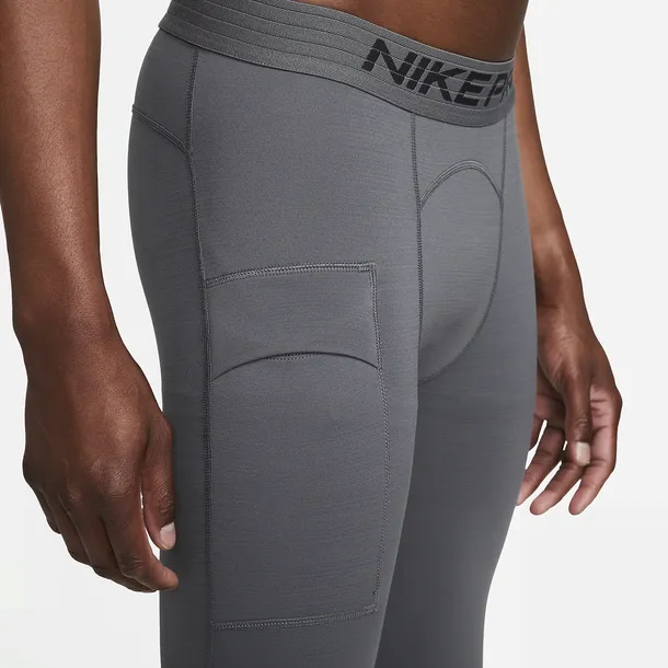 spodnie-termiczne-nike-pro-warm-material-dominujacy-poliester