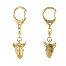 bulterier-bull-terrier-i-pozlocony-brelok-do-kluczy-z-psem-w-pudelku-pre