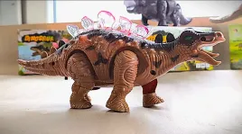 zabawka-chodzacy-dinozaur-stegozaur-z-efektami-dzwiekowymi-i-swietlnymi