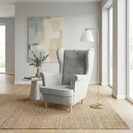 fotel-cosy-uszak-tapicerowany-z-przeszyciami-drewniane-wysokie-nozki-welur