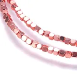 hem84-hematyt-koraliki-kostki-15x15mm-sznur-244szt-rose-gold