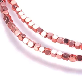 hem84-hematyt-koraliki-kostki-15x15mm-sznur-244szt-rose-gold