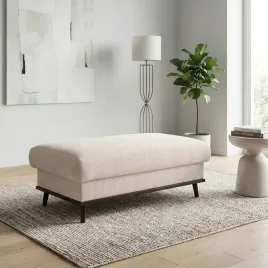 puf-nowoczesny-sofi-tapicerowany-podnozek-na-drewnianych-wysokich-nozkach