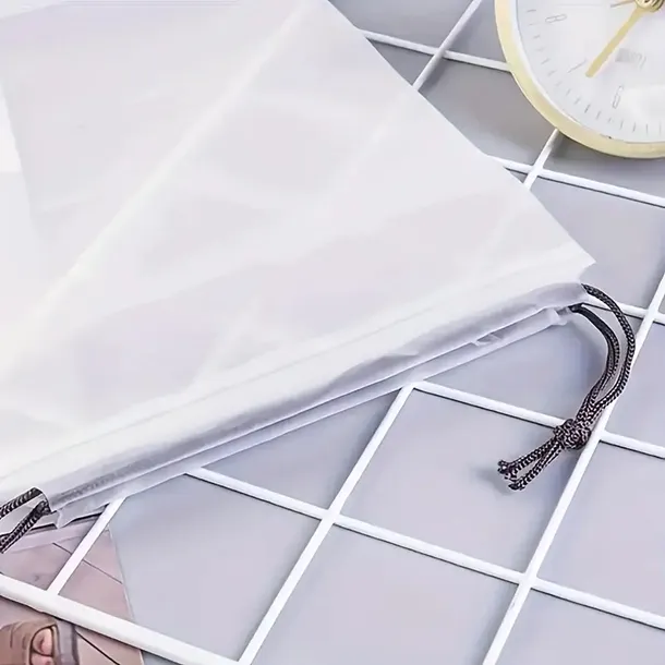 worki-podrozne-ze-sznurkiem-na-ubrania-akcesoria-bezbarwne-5szt-20x30cm-stan-opakowania-oryginalne