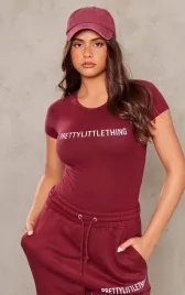 kc64308-prettylittlething-bordowe-body-z-nadrukiem-44-s