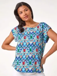 lc83309-roman-wzorzysta-bluzka-z-krotkim-rekawem-34-l