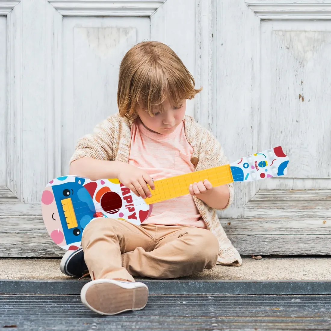 gitara-ukulele-dla-dzieci-plastikowa-instrument-hipcio-metalowe-4-struny