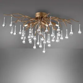 sufitowa-lampa-glamour-icicle-crystal-nad-stolik-mosiadz