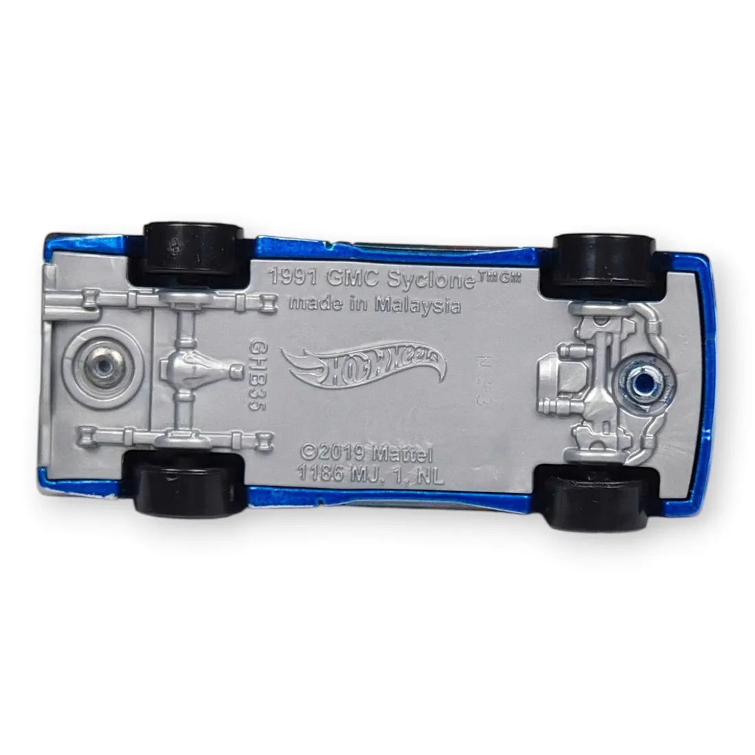 hot-wheels-91-gmc-syclone-luzak-stan-powystawowy