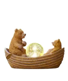 solrna-figurka-ogrodowa-z-niedzwiedziami-w-lodce-z-podswietlana-kula-led
