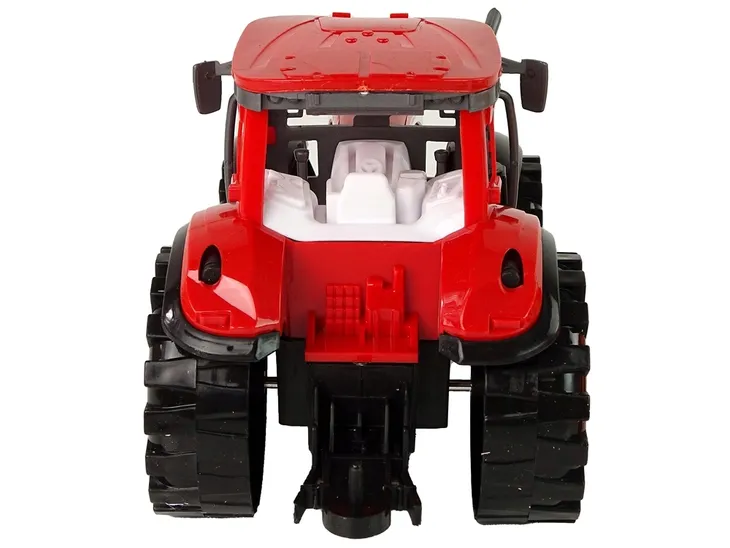 czerwony-traktor-z-kultywatorem-naped-material-plastik