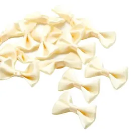 kokarda-muszka-ozdobna-4x25cm-kosc-sloniowa-2szt