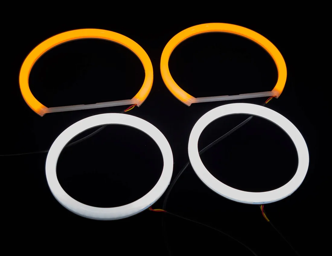 2w1-ringi-led-bmw-e60-e61-zolte-biale-2x106-2x131-stan-nowy