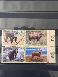 znaczki-fauna-zwierzeta-malpy-antylopy-niedzwiedzie-czysty-zn1