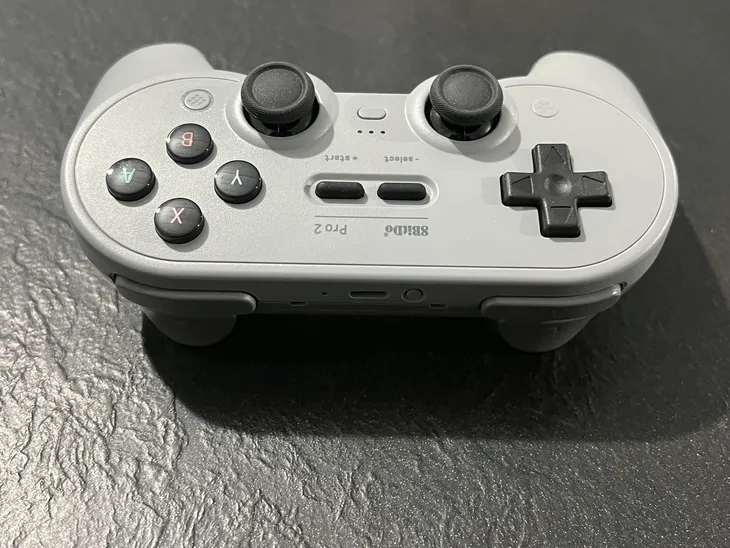 kontroler-bluetooth-8bitdo-pro-2-do-nintendo-switch-pc-steam-deck-szary-stan-powystawowy-kolor-szary