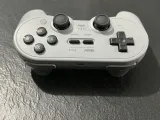 kontroler-bluetooth-8bitdo-pro-2-do-nintendo-switch-pc-steam-deck-szary-stan-powystawowy-kolor-szary