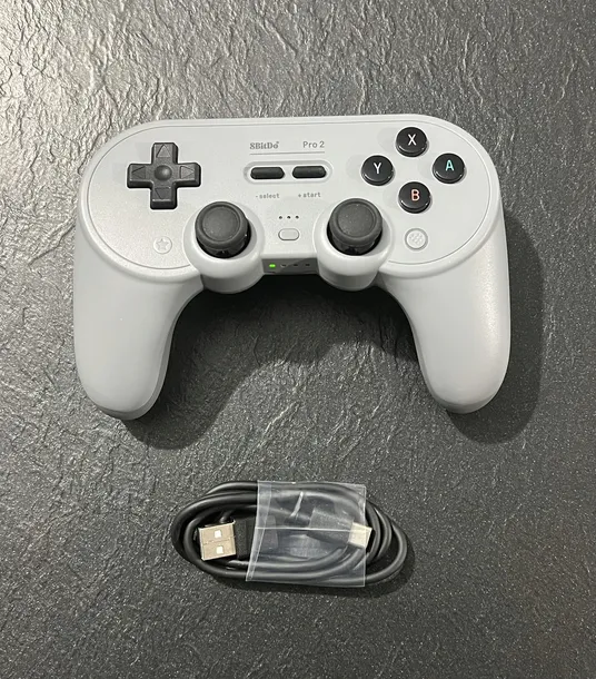 kontroler-bluetooth-8bitdo-pro-2-do-nintendo-switch-pc-steam-deck-szary-stan-powystawowy-pochodzenie-oryginal