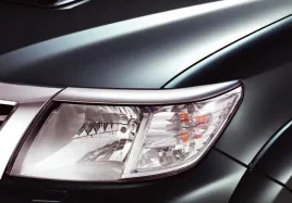toyota-hilux-ramki-wykonczeniowe-reflektorow-chrom-pz049-0k013-oe