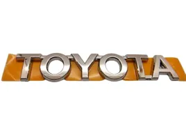toyota-yaris-chromowany-emblemat-logo-75446-52050-oe
