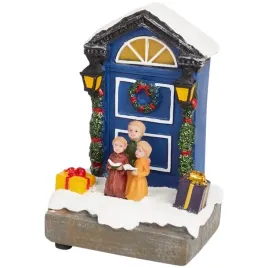 swiateczne-miasteczko-kolednicy-przy-drzwiach