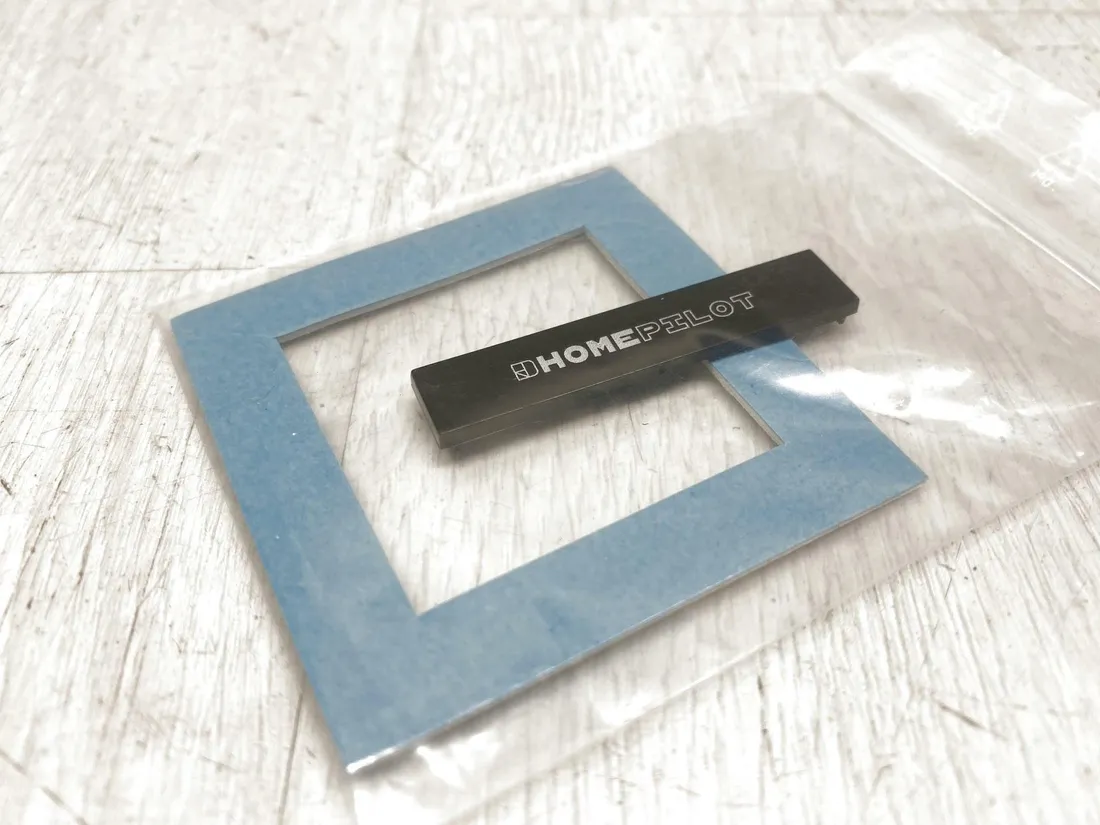 inteligentny-przelacznik-scienny-homepilot-12501001-bialy-stan-powystawowy