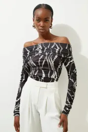 czarne-body-w-biale-kropki-z-drapowaniem-dlugi-rekaw-karen-millen-xs