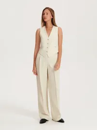 zolte-eleganckie-spodnie-z-kantem-reserved-l