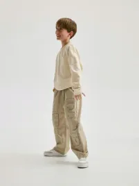 bezowe-spodnie-z-kieszeniami-reserved-164