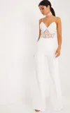 biale-proste-spodnie-materialowe-prettylittlething-s-fason-proste