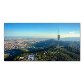 obraz-na-szkle-foto-gory-wieza-barcelona-100x50