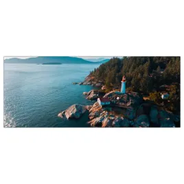 obraz-na-szkle-foto-latarnia-morska-ocean-125x50