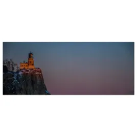 obraz-na-szkle-foto-latarnia-morska-zima-125x50