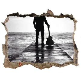 fototapeta-dziura-na-sciane-gitarzysta-na-molo