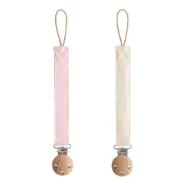 mushie-materialowa-zawieszka-do-smoczka-2-pak-blush-cream