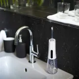 irygator-truelife-aquafloss-compact-l100-ipx7-300ml-6-koncowek-certyfikat-ce