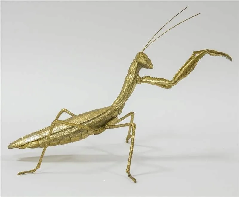 zlota-figurka-modliszka