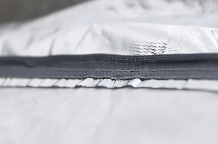 plandeka-pokrowiec-na-samochod-suv-van-waga-z-opakowaniem-0-15-kg