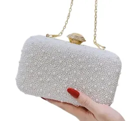 ekskluzywna-perlowa-torebka-wieczorowa-wizytowa-w-zlocie-slubna-bankiet