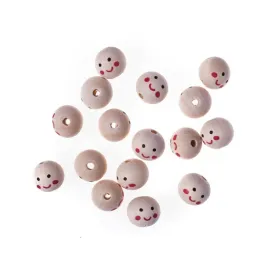 drewniane-okragle-koraliki-z-motywem-twarzy-usmiechnietej-buzki-16-sztuk