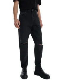 czarne-spodnie-jeansy-fason-carrot-bawelniane-klasyczne-z-dziurami