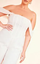 kremowy-kombinezon-proste-nogawki-teksturowany-plus