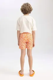 spodenki-luzne-krotkie-pomaranczowe-bialy-wzor-defacto-116-122