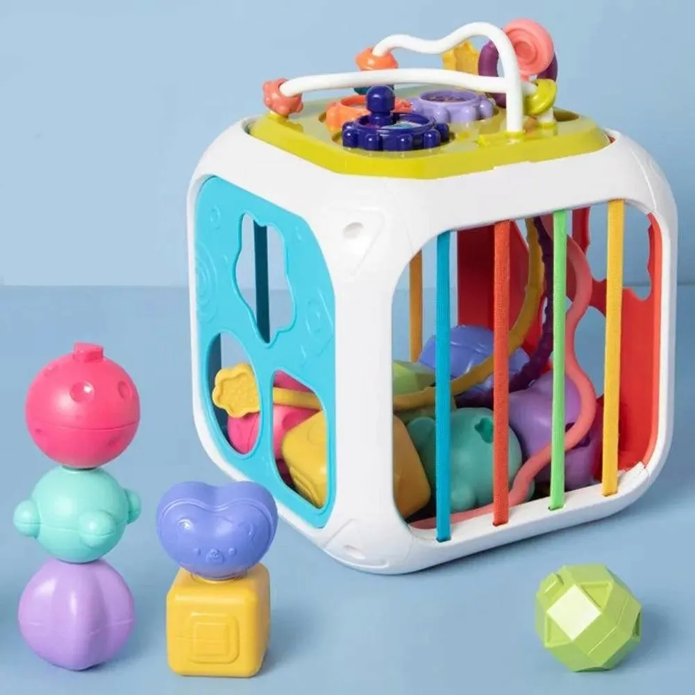 kostka-sensoryczna-sorter-edukacyjny-montessori-7w1-cymbalki-klocki-gumki-marka-doris
