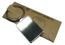 brelok-do-kluczy-metalowy-grawer-z-dwoch-stron-logo-napis-reklama