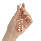 rosy-gold-clitoris-clamp-subtle-weight